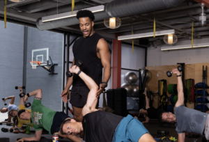 Dom teaching a fitness class at North Mass