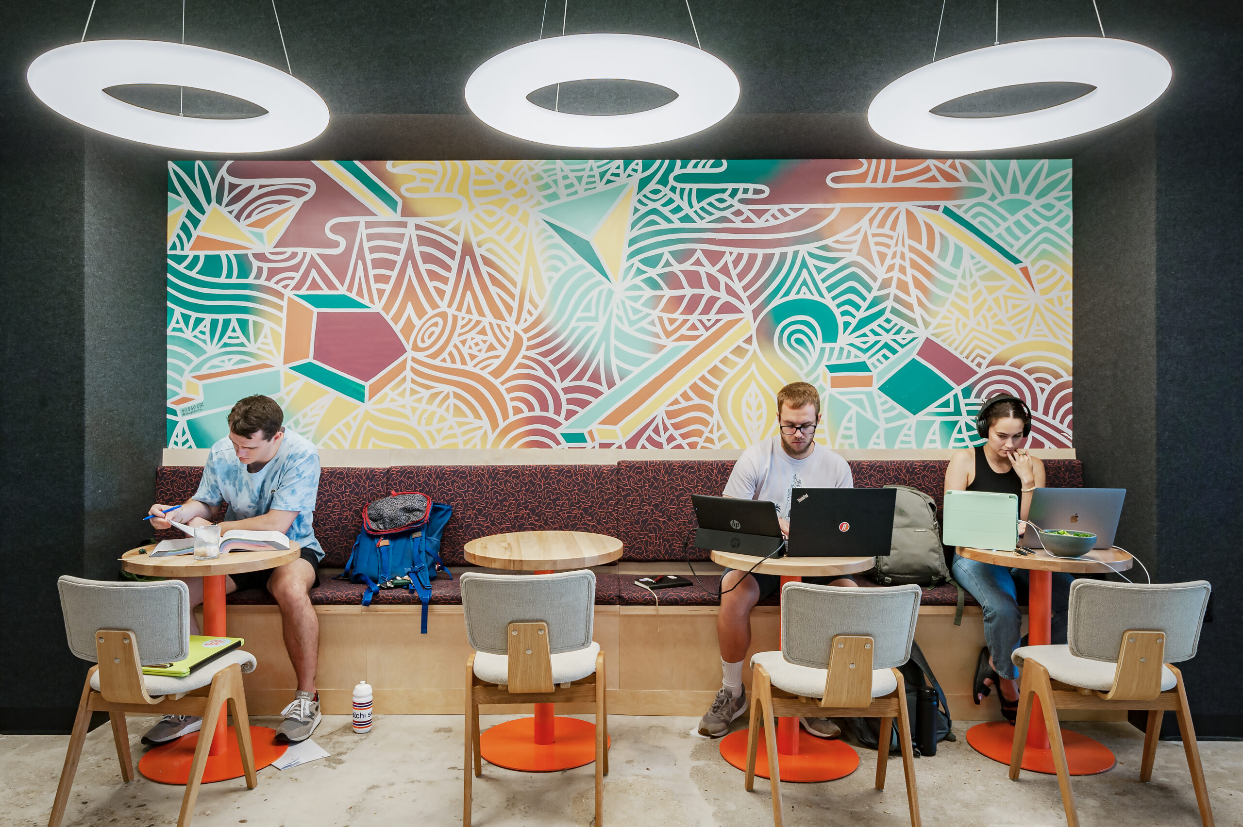 People studying at Top Out Cafe