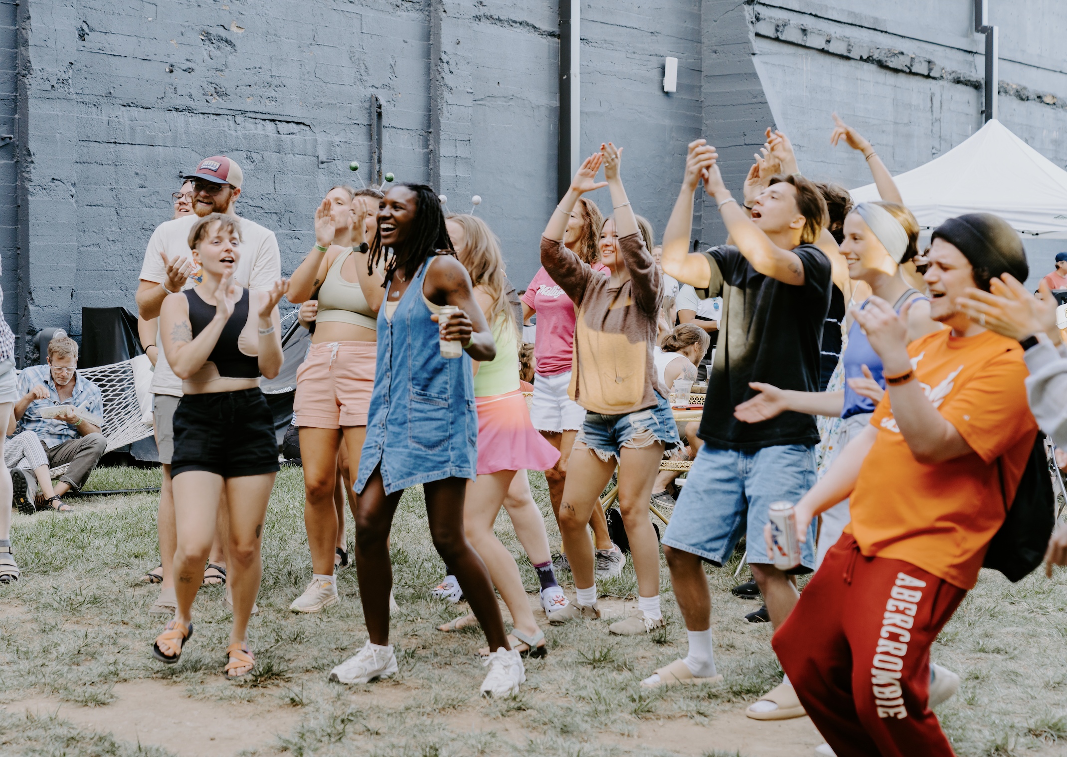 People dancing outside to music